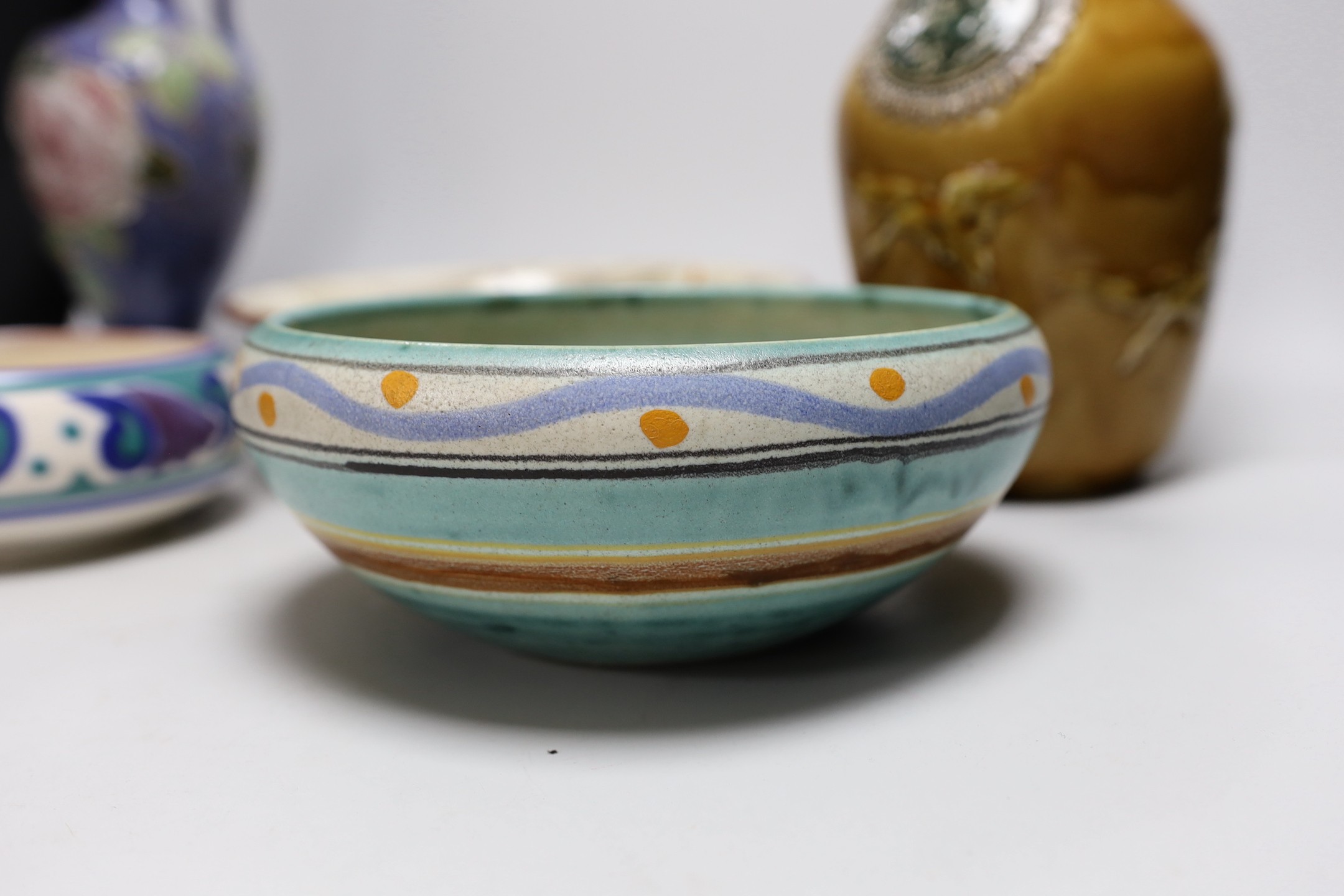 A Doulton stoneware vase and jug, tallest 28cm, together with three art ceramic bowls